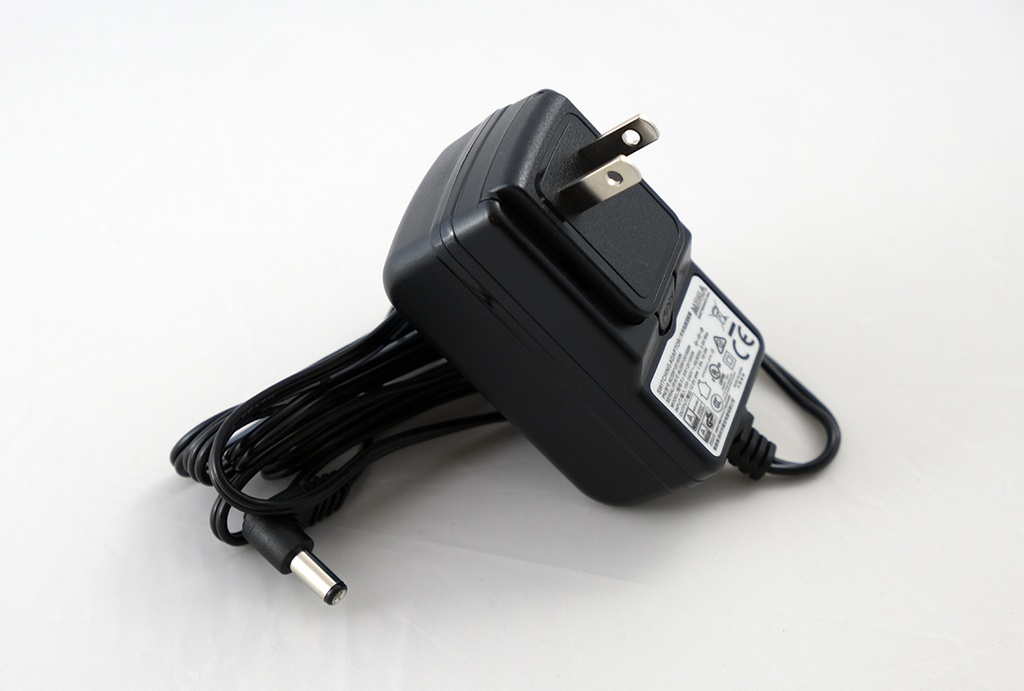 Adaptador de corriente para manómetro